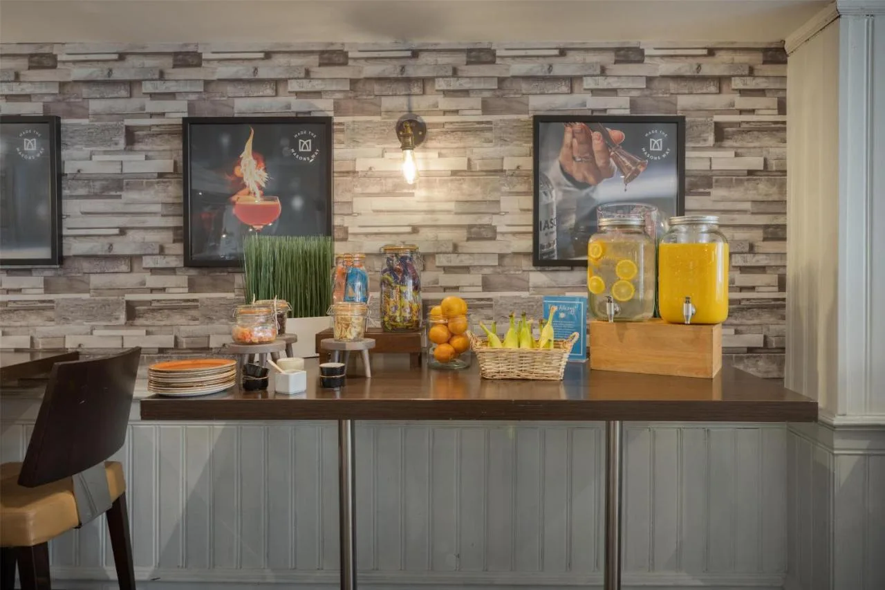 a counter with food and drinks on top of it at Hilton York in York